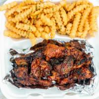 Bbq Ribs · includes 2 sides.