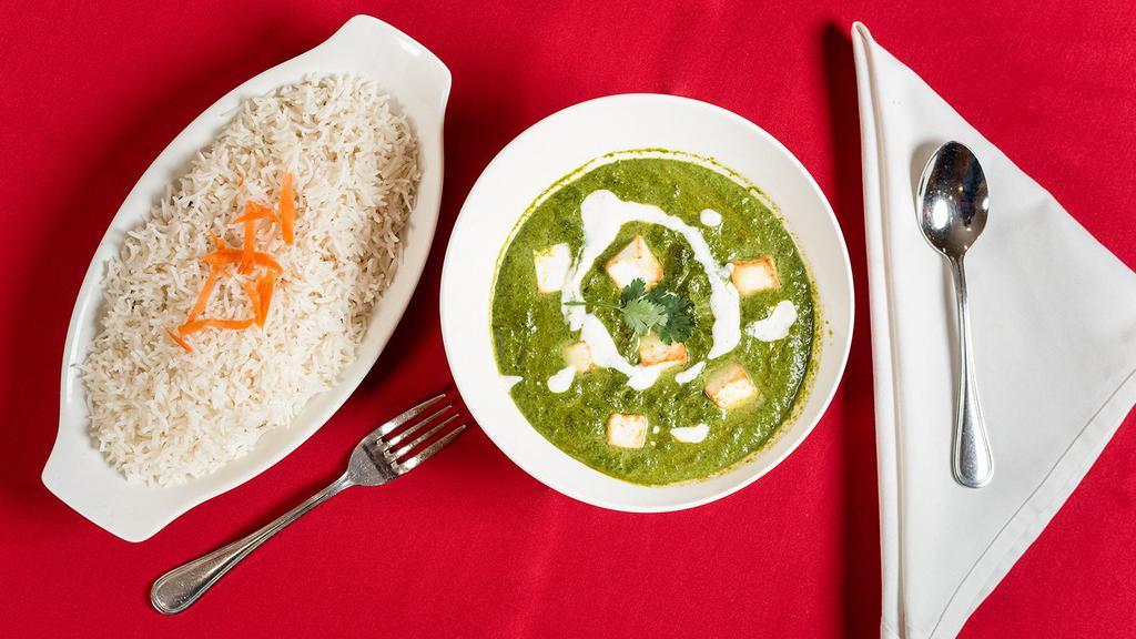 Palak Paneer · Fresh spinach cooked curry style with homemade cheese cream and seasoned with aromatic herbs.