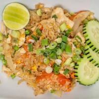 Thai Fried Rice · White onion, tomato, green peas, egg, carrots garnished with shredded green onion and lime. ...