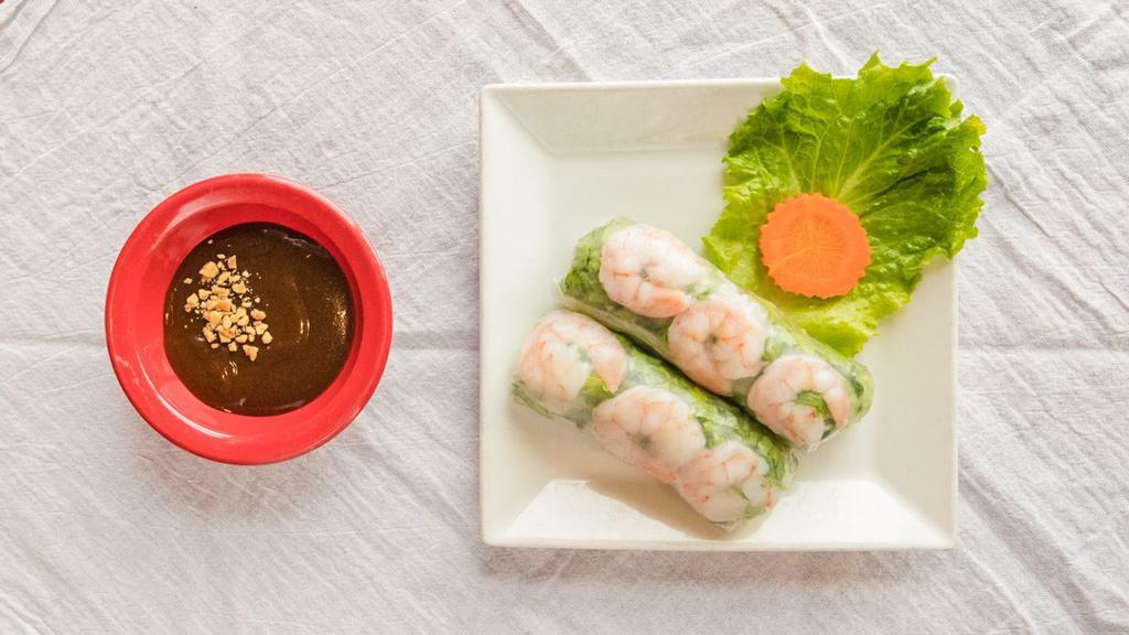 Shrimp Spring Rolls (2) · Rice paper roll with shrimp, lettuce and vermicelli noodle; served with peanut dipping sauce.