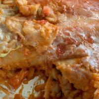 Enchiladas Verdes · 3 chopped beef enchiladas. Served with green sauce, rice and beans.