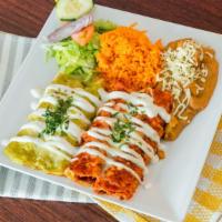 Enchiladas · Served with rice, beans, salad and tortillas.