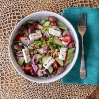 Owners Signature Greek Salad · Mixed greens, sliced red onion, Greek olives, cherry tomatoes, Greek feta (sheep) cheese, di...