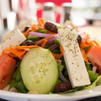 Greek Salad · Fresh greens with tomato, cucumbers, green peppers, red onions, carrots, Feta cheese, Greek ...