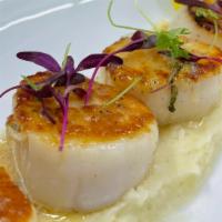 Seared Scallops · Parsnip puree, brown butter.