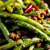 Dry Stir Fried Green Beans · Green beans, garlic, ginger, Szechuan red pepper, ground pork, and preserved Szechuan vegeta...