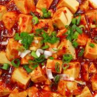 Ma Po Tofu · Silky Asian style tofu with garlic, ginger, scallions, and ground pork in traditional Szechu...