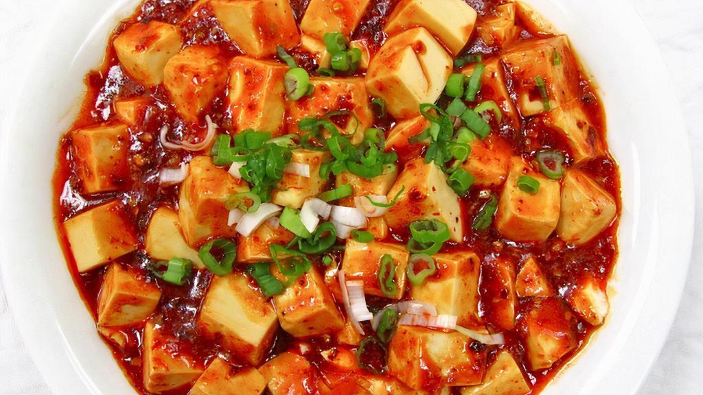 Ma Po Tofu · Silky Asian style tofu with garlic, ginger, scallions, and ground pork in traditional Szechuan Mapo sauce.
