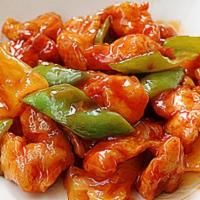 Authentic Pineapple Sweet And Sour Chicken · Deep fried chicken leg meat, coated with house made authentic sweet and sour sauce with pine...