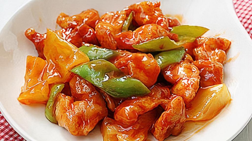 Authentic Pineapple Sweet And Sour Chicken · Deep fried chicken leg meat, coated with house made authentic sweet and sour sauce with pineapple, onion, and carrots.