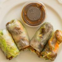 Spring Rolls (Goi Cuon) (4 Pc) · Served with chopped lettuce, bean sprouts, carrots, cilantro, and vermicelli. Served with pe...