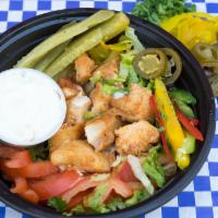 Chicken Shish Taouk Bowl · Chicken marinated in garlic with lettuce, pickles, homemade garlic spread.