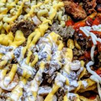 The Box · Mix and match any of our 4 loaded fries, loaded into a pizza box

Feeds 8-10 People