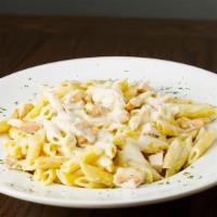 Penne Alla Rosati · Penne noodles, Parmesan, diced chicken, Alfredo sauce. Served with garlic bread and grated c...