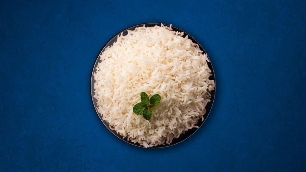 Pilaf Rice · Our long grain aromatic basmati rice, steamed to perfection.