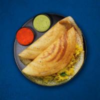 Magic Masala Dosa · A thin crepe made from a fermented batter of lentils and rice, stuffed with mildly spiced po...