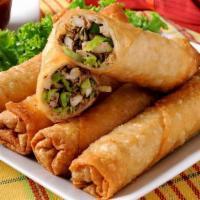 Original Crispy Spring Rolls · Green cabbage, carrots, fresh herbs, bean sprouts wrapped in rice wrapper and deep fried, se...