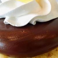 Boston Cream · Vanilla Bean Cake filled with Bavarian cream topped with Decadent Fudge and a drop bavarian ...