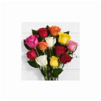 Loose Wrapped Colored Roses · A dozen mixed colored roses loosely wrapped.
