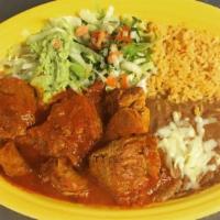 #38. Chori Pollo · Chicken breast topped with chorizo and cheese dip. Served with rice, beans and tortillas.