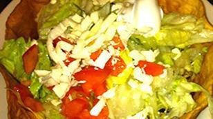 #49. Taco Loco Salad · A crispy fried flour shell with grilled chicken or steak, lettuce, cheese, tomato, sour crea...