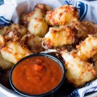 Nana Sue'S Cheese Curds · White cheddar cheese, beer batter, side of marinara for dipping.