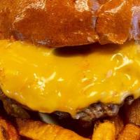Kidz Cheeseburger · American cheese and pickle. Served with choice of tater tots, applesauce or veggies and dip....
