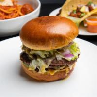 Chitown Burger · Two Prime Beef 4oz. Patties | Lettuce | Pickle | Onion | Secret Sauce | White American Chees...