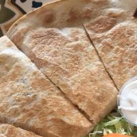 Quesadilla Grande · Giant quesadilla with meat and cheese. Served with of side sour cream, jalapeños, and guacam...