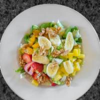 Pacific Fruit Salad · Mixed greens, fresh bananas, pineapple, strawberries, mandarin oranges and walnuts with gril...