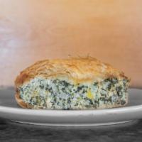 Spinach Pie (Spanakopita) · Homemade spinach and feta cheese mixture baked in layers of phyllo. It's great.
