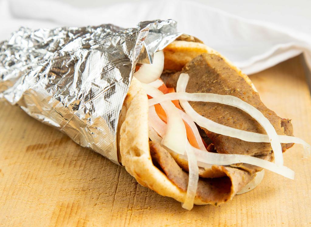 Gyros Supreme · Gyro served with feta cheese, lettuce, onions, tomatoes and our homemade gyro sauce.