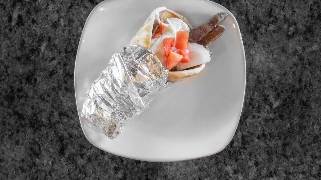 Gyros · The best! Seasoned sliced lamb and beef, tomatoes, onions and our homemade gyro sauce served in a grilled pita.