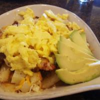 Huevos Rancheros · Cubed potatoes, chorizo, cheddar jack cheese, green peppers, tomatoes, onions and avocado to...