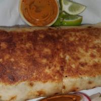 Burritos · Large Flour Torilla  with beans your choice of meat, lettuce,tomatoes,onion,cilantro,cheese ...