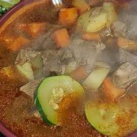 Caldo De Res / Beef Stew · Beef stew with vegetables (carrots, potatoes and mexican zucchini) served with rice and  a s...