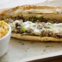 Philly Cheese Steak · Philadelphia ribeye shaved steak served on amarosso Philly hoagie with grilled onions, peppe...