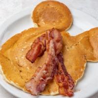 Kid'S Mickey Mouse Pancakes · Includes choice of bacon or sausage and small drink.