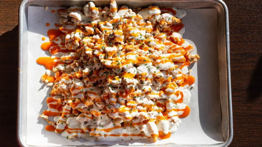 Loaded Fries · Waffle fries topped with chicken, buffalo sauce, and Waffle That sauce.
