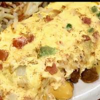 Western Omelette · With ham, cheese, green peppers and onions.