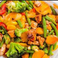 Chicken Stir Fry · Marinated chopped chicken breast with stir fry vegetables over a bed of rice with teriyaki s...