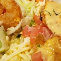 Po Boy Shrimp · Lightly dusted fried shrimp with lettuce, tomato and chipotle aioli.