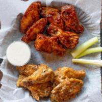 6  Wings With Bones · All wings served with celery, your choice of ranch or blue cheese, and your choice of sauce....