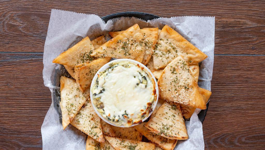 Spinach & Artichoke Dip · Served with tortilla chips or pita chips.