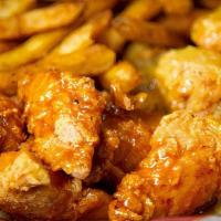 6  Traditional  Wings · Comes In a Variety Of Different Flavors : Hot,Holy,Zinger, Mango Habernero, Garlic Parm, Swe...