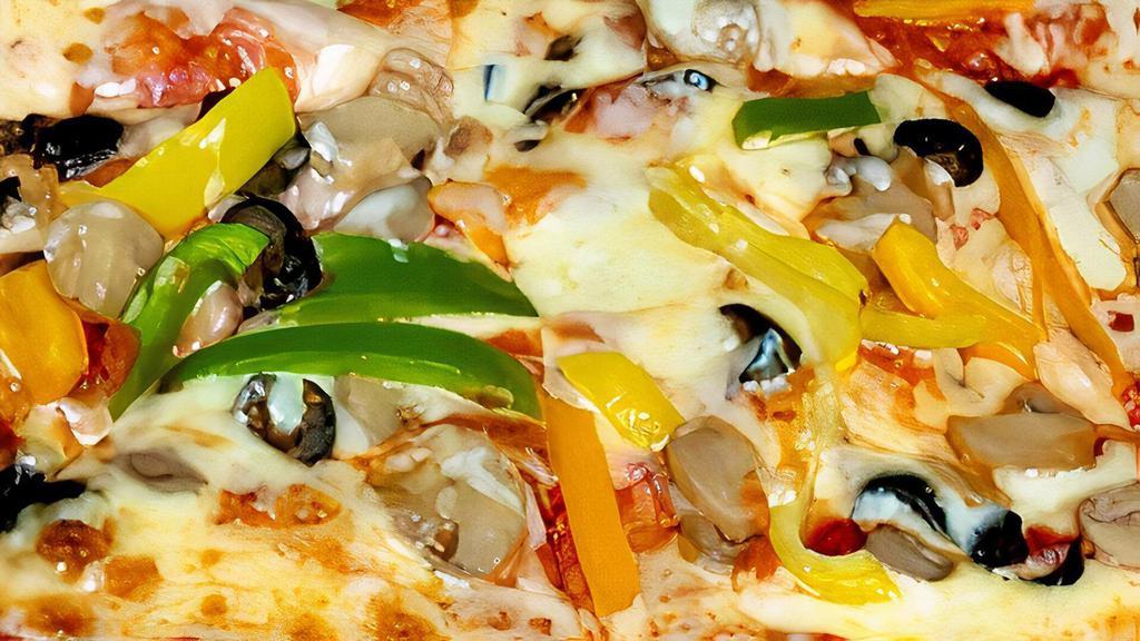 Veggie Pizza · Green peppers, green olives, black olives, spinach and mushrooms.