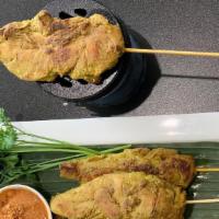 Chicken Satay · Mrinated chicken on a skewer served with peanut sauce