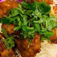 Thai Wings · Deep fried chicken wings tossed in Thai chili sauce.
