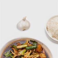 Pad Kra Tiem Prik Tai · Sauteed garlic, black peppers, green onions and water chestnuts stir-fried in brown sauce.