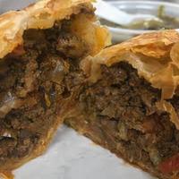 01 - Beef Criolla Empanada - Baked - 1 Each · 1 baked empanalda. Ground beef, white and green onions, and red peppers. No modifications. S...